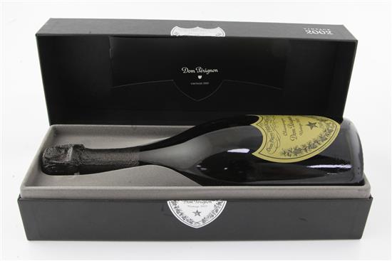 One bottle of Dom Perignon 2002 Vintage Champagne, in presentation box.